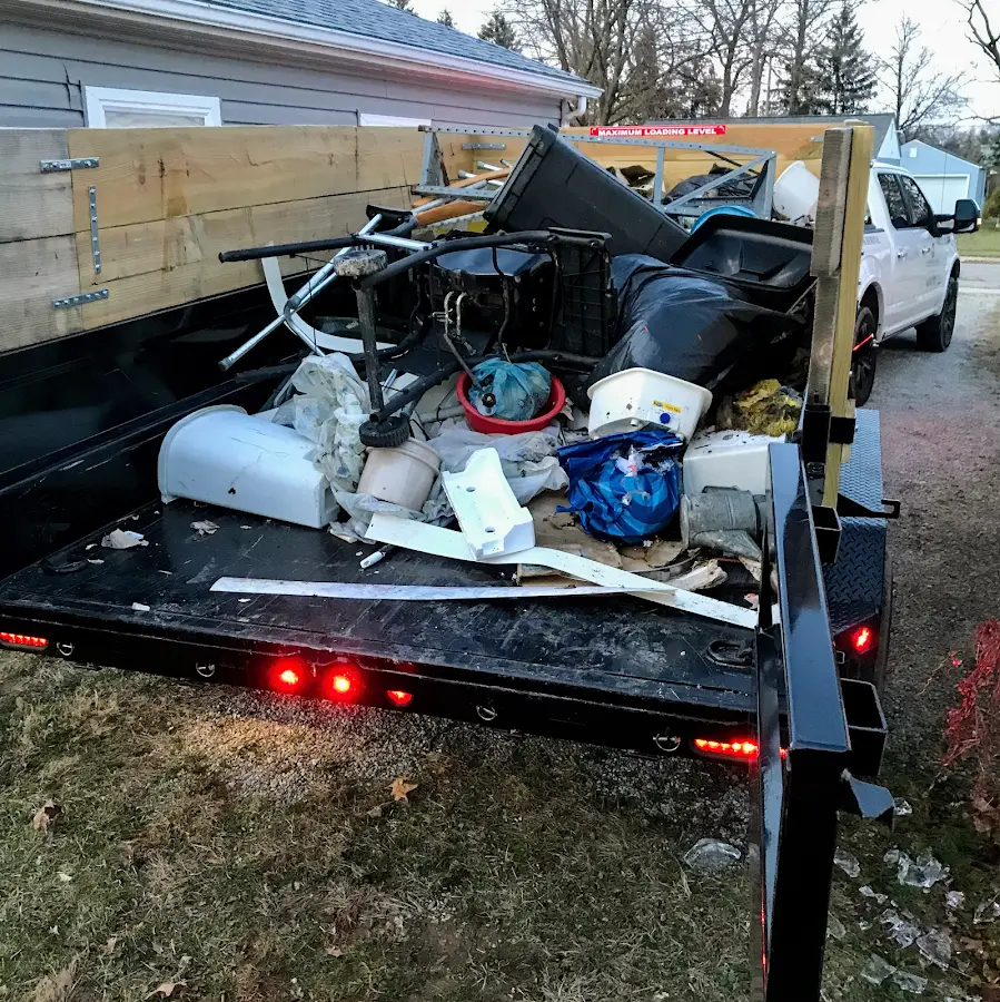 Roll-off dumpster delivered to a residential driveway in Floris